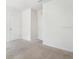Bedroom with soft carpet, white walls, and neutral tones at 10913 Trailing Vine Dr, Tampa, FL 33610