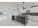 Open-concept kitchen with marble flooring and a large island at 211 Dolphin Pt # 401, Clearwater, FL 33767