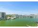 Stunning waterfront view with marina and city skyline at 211 Dolphin Pt # 401, Clearwater, FL 33767