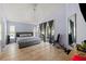 Bright bedroom with a king-size bed and sliding glass doors to a patio at 4931 Ridgemoor Cir, Palm Harbor, FL 34685