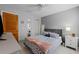 Cozy bedroom with a queen-size bed and ample closet space at 4931 Ridgemoor Cir, Palm Harbor, FL 34685