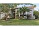 Single-story home with nicely landscaped front yard at 4931 Ridgemoor Cir, Palm Harbor, FL 34685