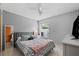 Spacious bedroom with a king-size bed and plenty of natural light at 4931 Ridgemoor Cir, Palm Harbor, FL 34685