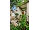 Front entry with well-manicured landscaping and stone pathway at 4931 Ridgemoor Cir, Palm Harbor, FL 34685