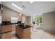 Modern kitchen with island and skylights at 4931 Ridgemoor Cir, Palm Harbor, FL 34685