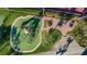 Aerial view of a community playground with play equipment at 4931 Ridgemoor Cir, Palm Harbor, FL 34685