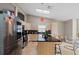 Modern kitchen with stainless steel appliances and island at 4931 Ridgemoor Cir, Palm Harbor, FL 34685
