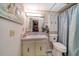 Clean bathroom with single sink vanity and shower/tub at 9950 62Nd N Ter # 315, St Petersburg, FL 33708