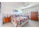 Serene bedroom with a comfortable bed, natural light, and neutral decor creating a peaceful retreat at 12300 Vonn Rd # 3204, Largo, FL 33774