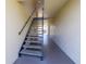 Exterior stairwell leading to upper units at 12300 Vonn Rd # 3204, Largo, FL 33774