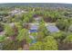 Property overview showing home, pool, and surroundings at 12476 Jaybird Rd, Weeki Wachee, FL 34614