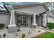 Inviting front porch with seating area and landscaping at 12476 Jaybird Rd, Weeki Wachee, FL 34614