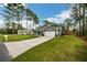 House with driveway and well-maintained lawn at 12476 Jaybird Rd, Weeki Wachee, FL 34614