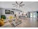 Open concept living and kitchen area with modern finishes at 12476 Jaybird Rd, Weeki Wachee, FL 34614