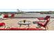 Enjoy outdoor living on this rooftop deck, complete with comfortable seating and beautiful neighborhood views at 3087, 3075 Cherry Ln, Clearwater, FL 33759