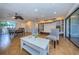Open living area with built-in entertainment center and tiled floors at 180 Ingrid Pl, Oldsmar, FL 34677