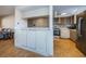 Updated kitchen with modern cabinetry and breakfast bar at 180 Ingrid Pl, Oldsmar, FL 34677