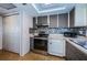 Modern kitchen with stainless steel appliances and updated cabinetry at 180 Ingrid Pl, Oldsmar, FL 34677