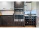 Modern kitchen with stainless steel appliances and wine storage at 1848 Shore S Dr # 501, South Pasadena, FL 33707