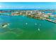 Aerial view showcasing waterfront community and boats at 1848 Shore S Dr # 501, South Pasadena, FL 33707