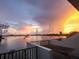 Scenic sunset view from balcony overlooking the water at 1848 Shore S Dr # 501, South Pasadena, FL 33707