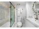 Clean bathroom with marble tile and glass shower at 1848 Shore S Dr # 501, South Pasadena, FL 33707