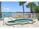 Relaxing hot tub with waterfront views and privacy fence at 1848 Shore S Dr # 501, South Pasadena, FL 33707