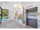 Building lobby with elevator, mailboxes, and unique wall art at 1848 Shore S Dr # 501, South Pasadena, FL 33707