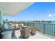 Relaxing balcony with water views and outdoor seating at 1848 Shore S Dr # 501, South Pasadena, FL 33707