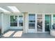 Bright balcony with sliding doors leading to the kitchen and living areas at 1848 Shore S Dr # 501, South Pasadena, FL 33707