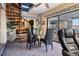 Sunroom with spiral staircase, pool view, and comfortable seating for relaxation at 429 3Rd N Ave, Tierra Verde, FL 33715