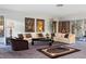 Relaxing living room with sectional sofa, coffee table, and large windows offering abundant natural light at 429 3Rd N Ave, Tierra Verde, FL 33715