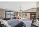 Primary bedroom with stunning water views and private balcony access at 429 3Rd N Ave, Tierra Verde, FL 33715