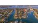 Waterfront home situated on a tranquil canal, offering easy boat access and stunning views at 429 3Rd N Ave, Tierra Verde, FL 33715
