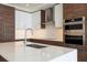 Modern kitchen with stainless steel appliances and an island at 301 1St Street South # 2304, St Petersburg, FL 33701