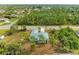 Aerial view of a single Gathering home with a large backyard at 9555 Hallendale Dr, Port Charlotte, FL 33981