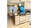 Kitchen featuring a dishwasher and an island with seating at 1655 S Highland Ave # J194, Clearwater, FL 33756