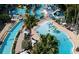 Resort-style pool with a lazy river and plenty of lounge chairs at 399 2Nd St # 815, Indian Rocks Beach, FL 33785