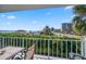 Relaxing balcony with outdoor furniture and a scenic waterfront view at 1351 Gulf Blvd # 219, Clearwater, FL 33767