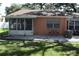 Cozy patio area with seating and access to a screened-in porch at 2250 Druid E Rd # 605, Clearwater, FL 33764