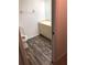 Bathroom with wood-look flooring and a vanity at 9720 Indian Key Trl # 117, Seminole, FL 33776