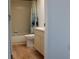 Clean bathroom with tub, shower, toilet and vanity at 9720 Indian Key Trl # 117, Seminole, FL 33776