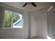 Bedroom with window, ceiling fan and closet at 9720 Indian Key Trl # 117, Seminole, FL 33776