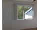 Bright bedroom with window and closet at 9720 Indian Key Trl # 117, Seminole, FL 33776