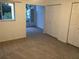 Bright bedroom with large closet and view of nature at 9720 Indian Key Trl # 117, Seminole, FL 33776