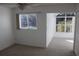 Spacious bedroom featuring a sunlit alcove and ample closet space at 9720 Indian Key Trl # 117, Seminole, FL 33776