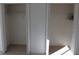 and mirrored closet doors with hanging rods and shelving at 9720 Indian Key Trl # 117, Seminole, FL 33776