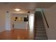 Kitchen with breakfast bar and access to the living room at 9720 Indian Key Trl # 117, Seminole, FL 33776