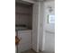 Stackable washer and dryer in a laundry closet at 9720 Indian Key Trl # 117, Seminole, FL 33776