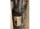 Interior view of a closet containing the water heater and other mechanicals at 9720 Indian Key Trl # 117, Seminole, FL 33776